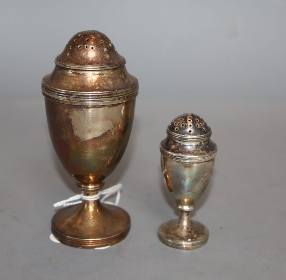 A George III silver pedestal caster, Chawner & Eames, London, 1796 and a similar smaller caster, London, 1797, 75mm, 4oz.